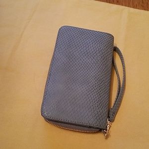 A new day wristlet. NWOT.